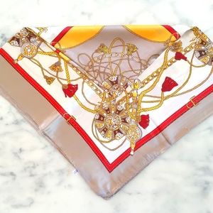NWT. MOSI Gold and tan silk scarf.